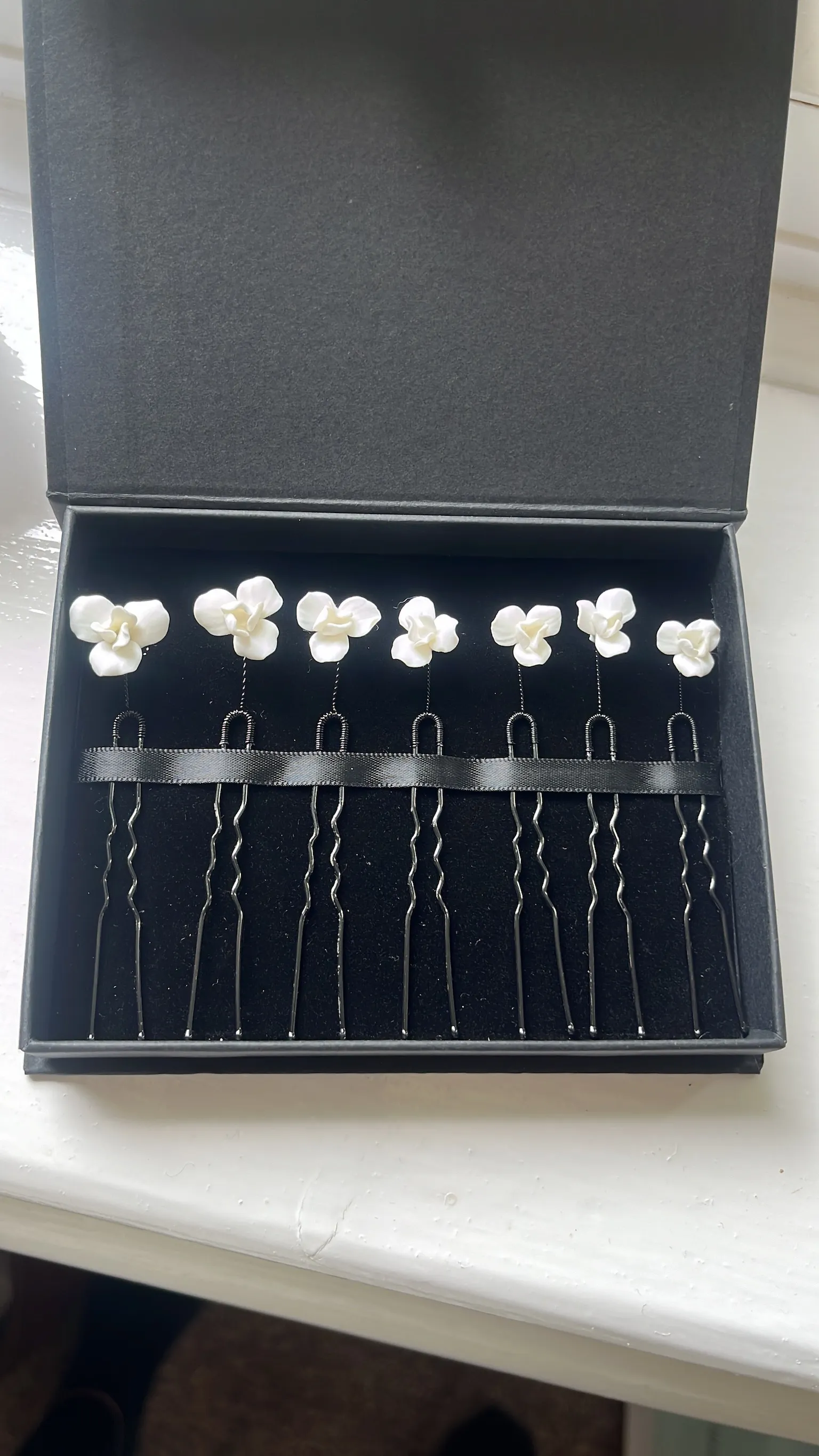 Set of seven Beauflora flower hair pins in black box